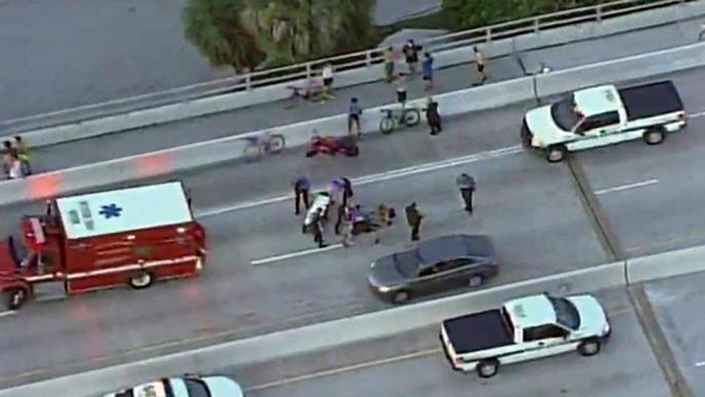 Officials in Florida say they're investigating a shooting that took place on a bridge that links Miami and Key Biscayne and was apparently featured in a Facebook video.