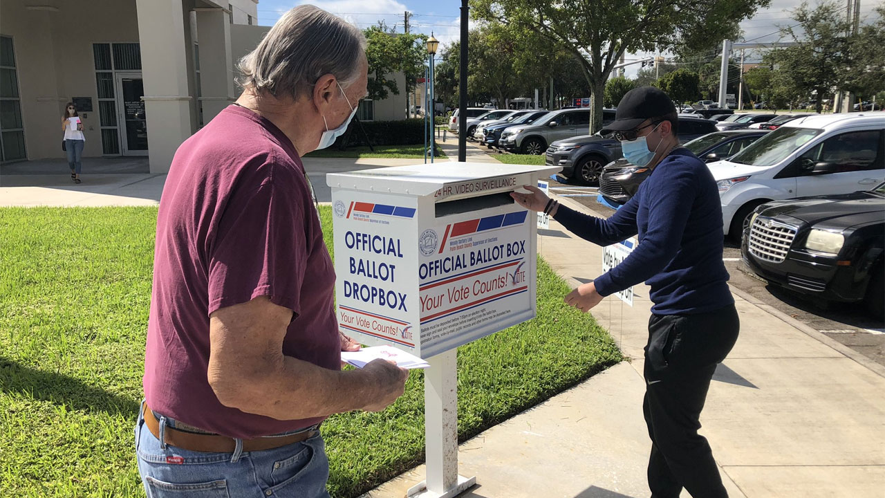 Palm Beach County voters drop off their ballots