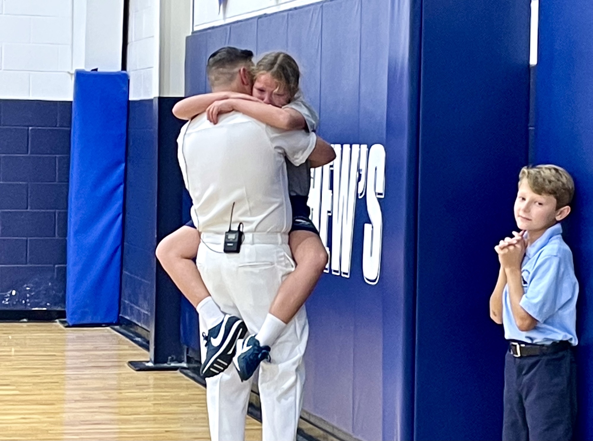 surprise military homecoming at saint matthew's catholic school.jpeg