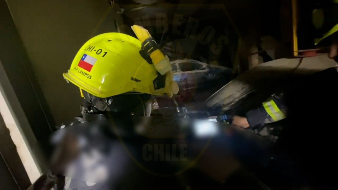 man pulled from rubble.png
