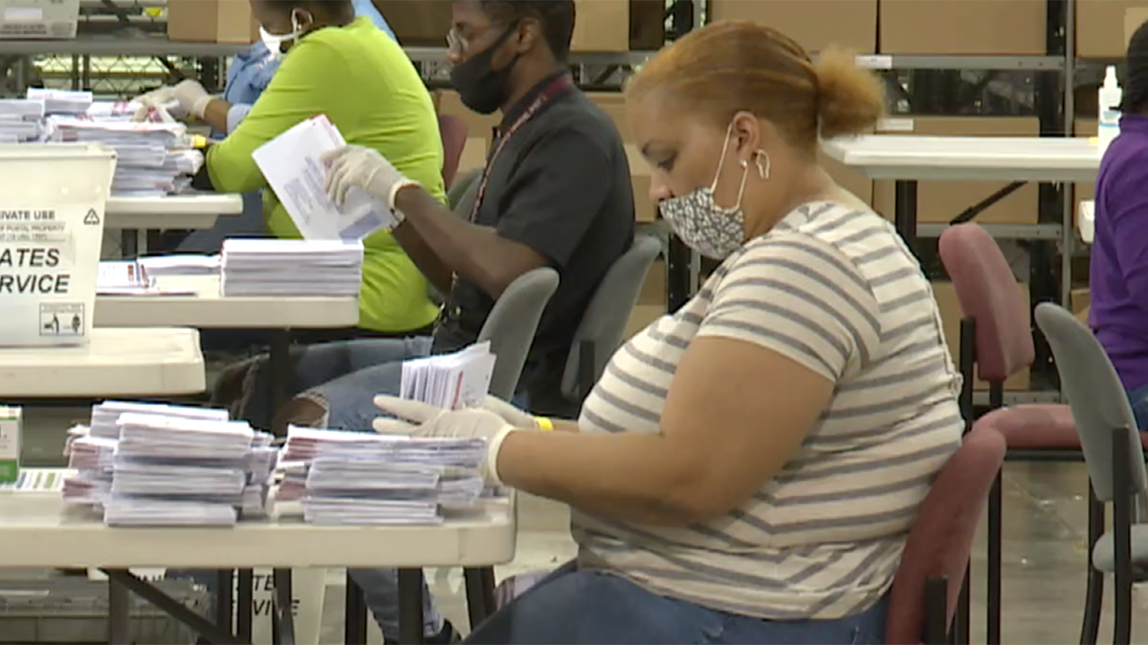 Ballots removed from envelopes to be counted at the Palm Beach County Elections Tabulation Office in Riviera Beach, Fla. on Aug. 18, 2020.