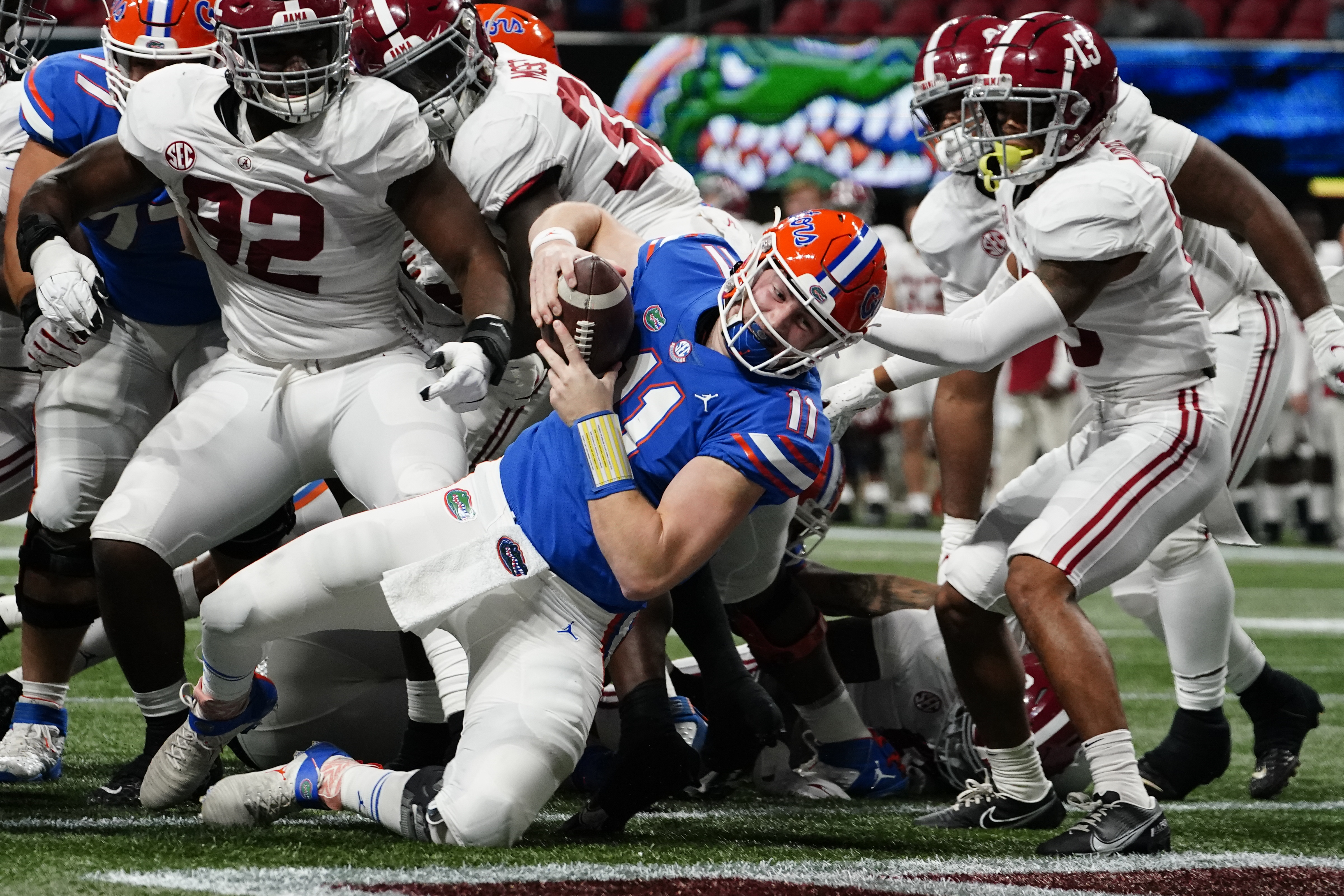 Florida Gators QB Kyle Trask leaps into end zone vs. Alabama Crimson Tide in 2020 SEC Championship