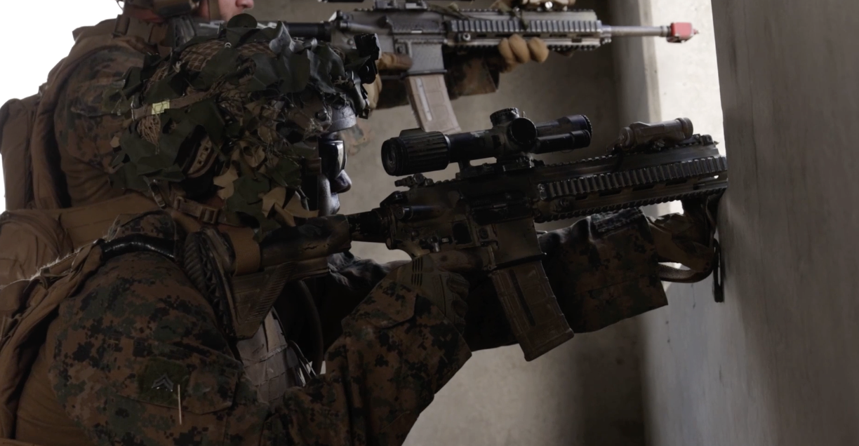 Soldiers fire guns during war games in Australia. 