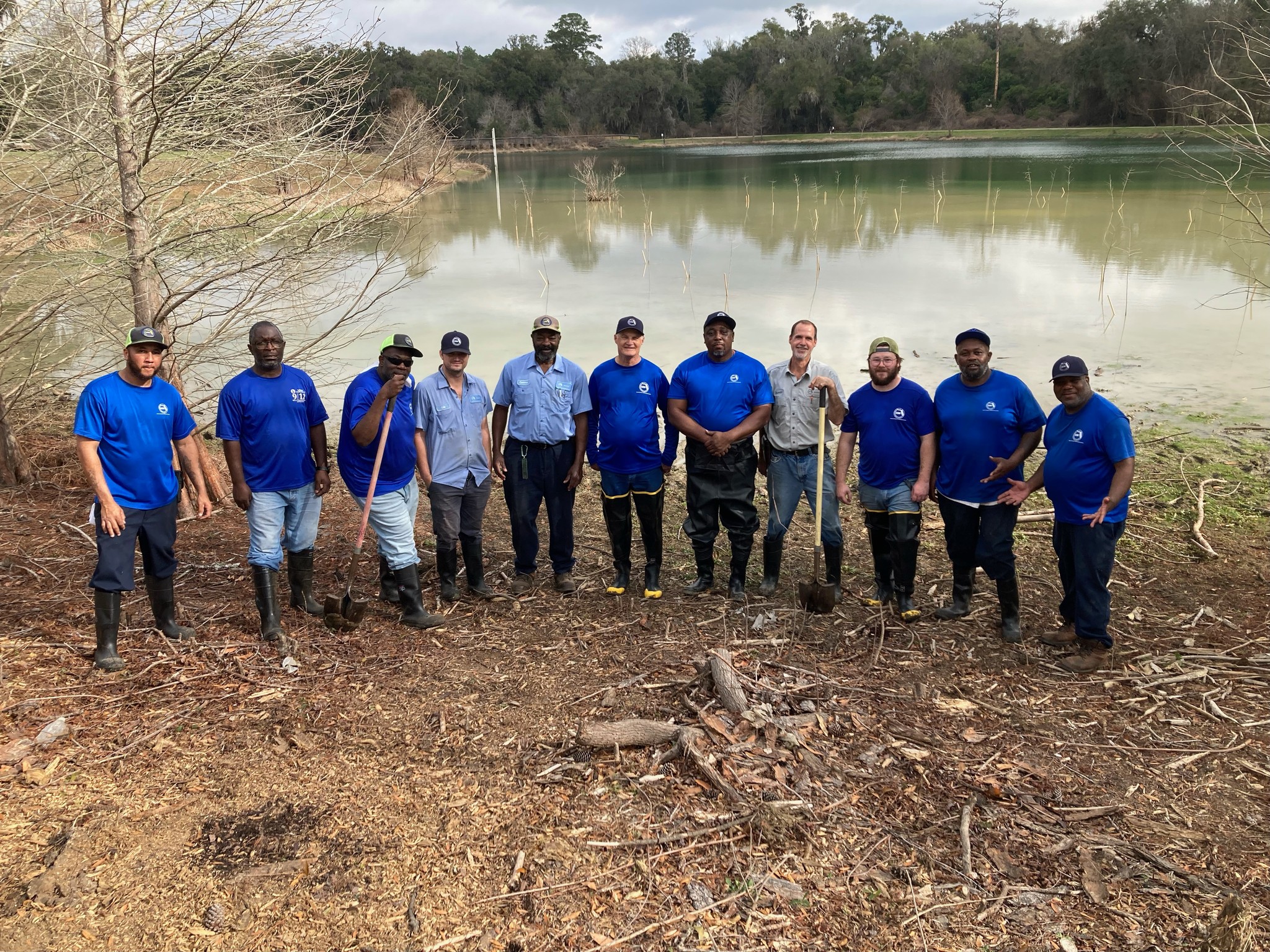 Leon County crew plants 75 cypress trees to promote health of Pedrick Pond