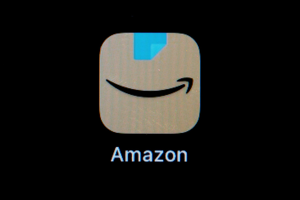 The Amazon app icon is seen on a smartphone, Feb. 28, 2023, in Marple Township, Pa. 