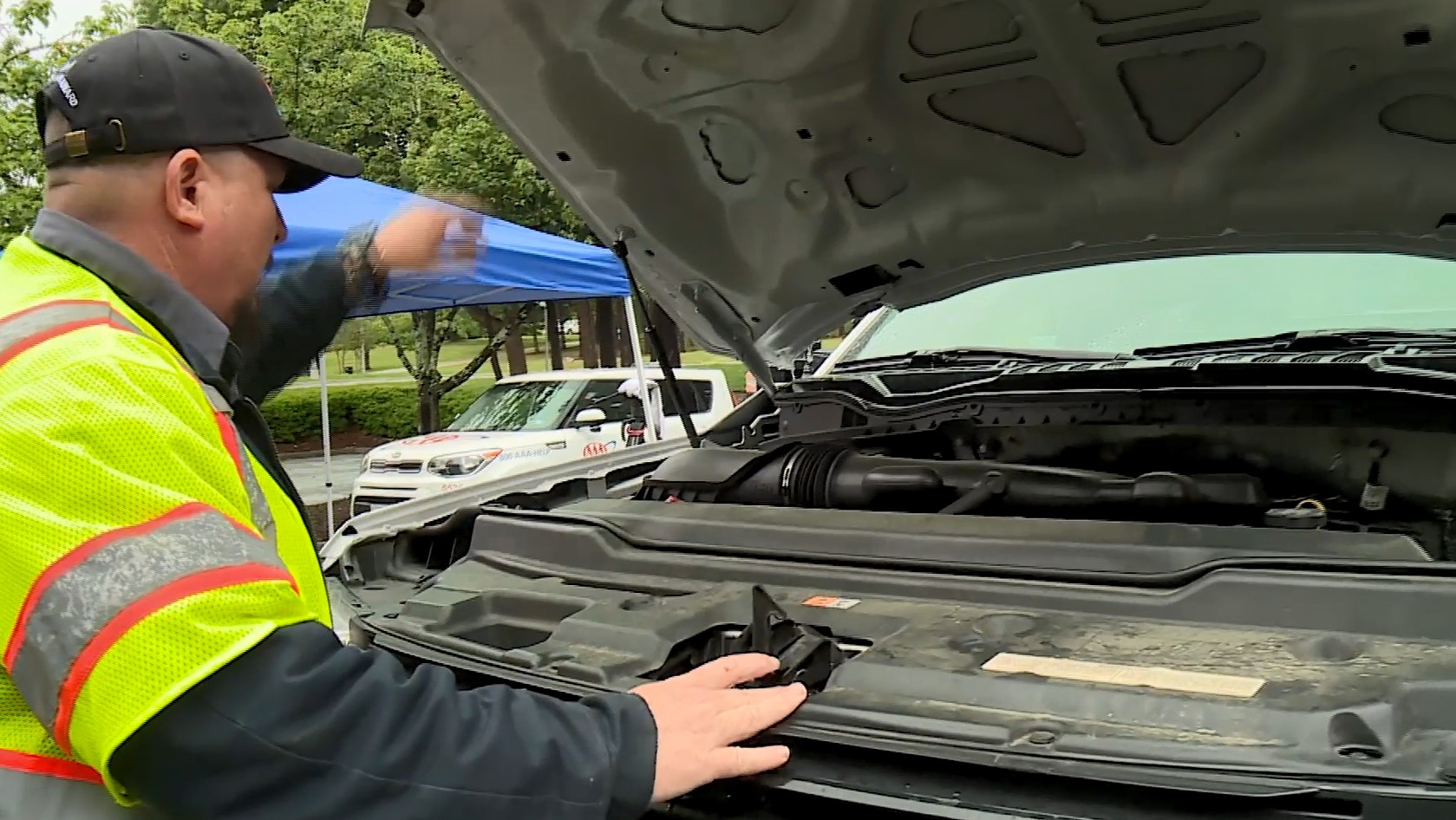 Mechanic Checking CAr.jpg
