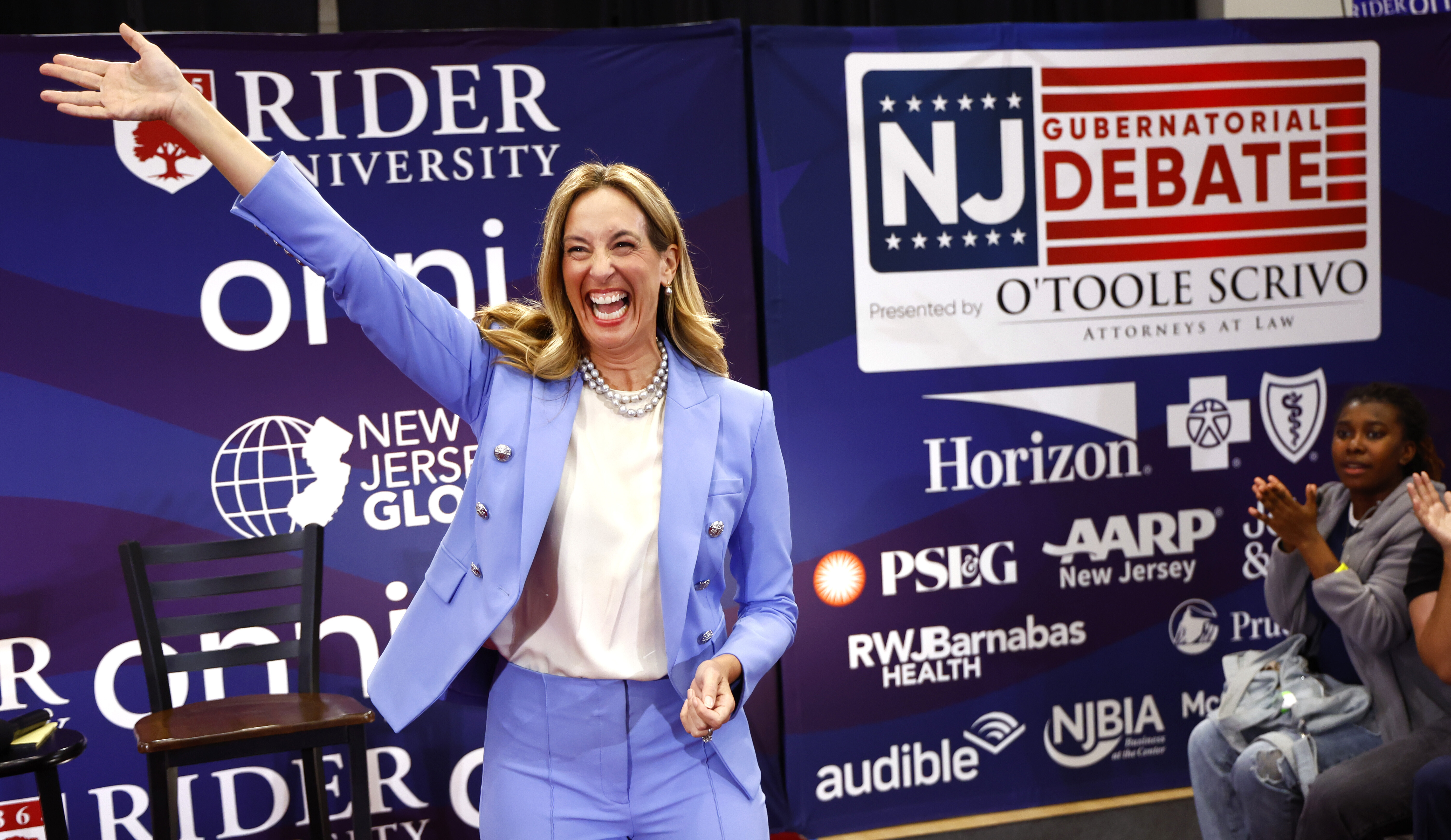 Democrat Mikie Sherrill waves before the first general election gubernatorial debate with Jack Ciattarelli, Sunday, Sept. 21, 2025, in Lawrenceville, N.J. 
