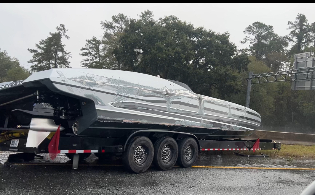 truck carrying boat 