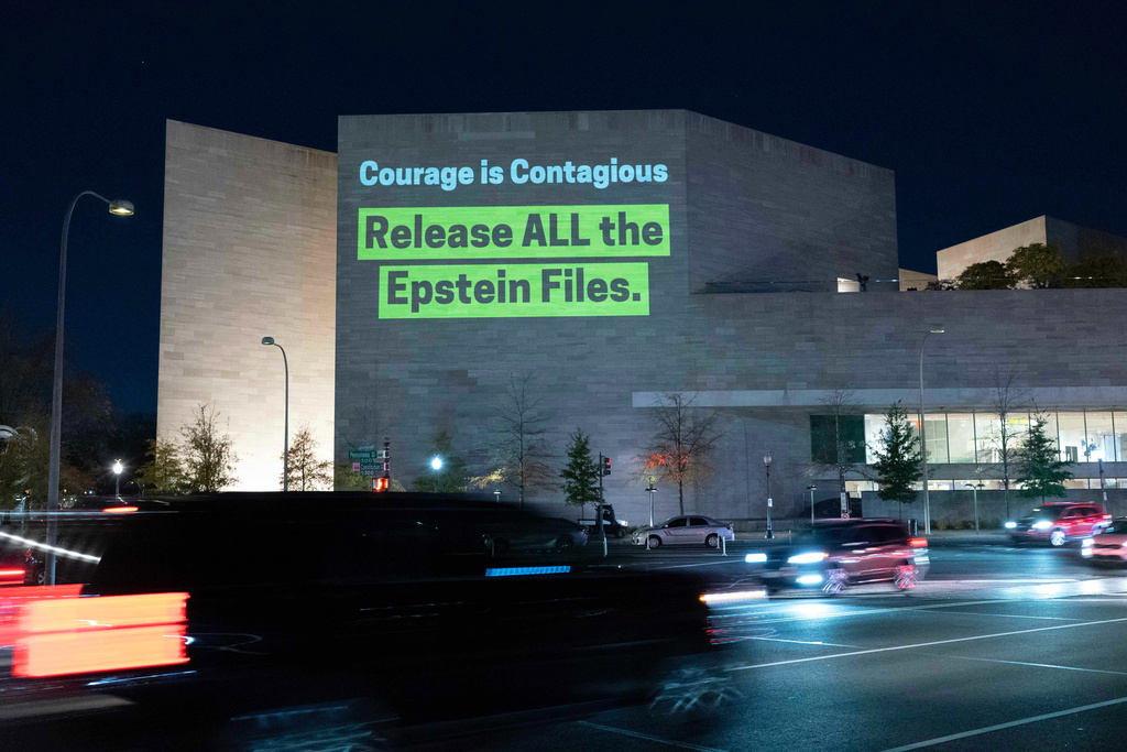 A World Without Exploitation projection is seen on the wall of the National Gallery of Art demanding the Justice Department release all files it has on its investigation into convicted sex offender Jeffrey Epstein.