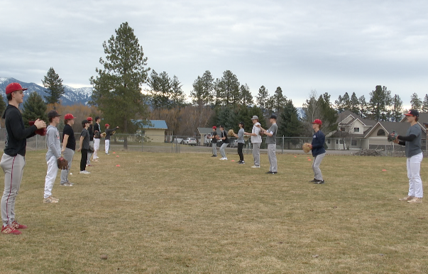 Flathead High School Baseball players warming up at ABS Park, March, 19 2023