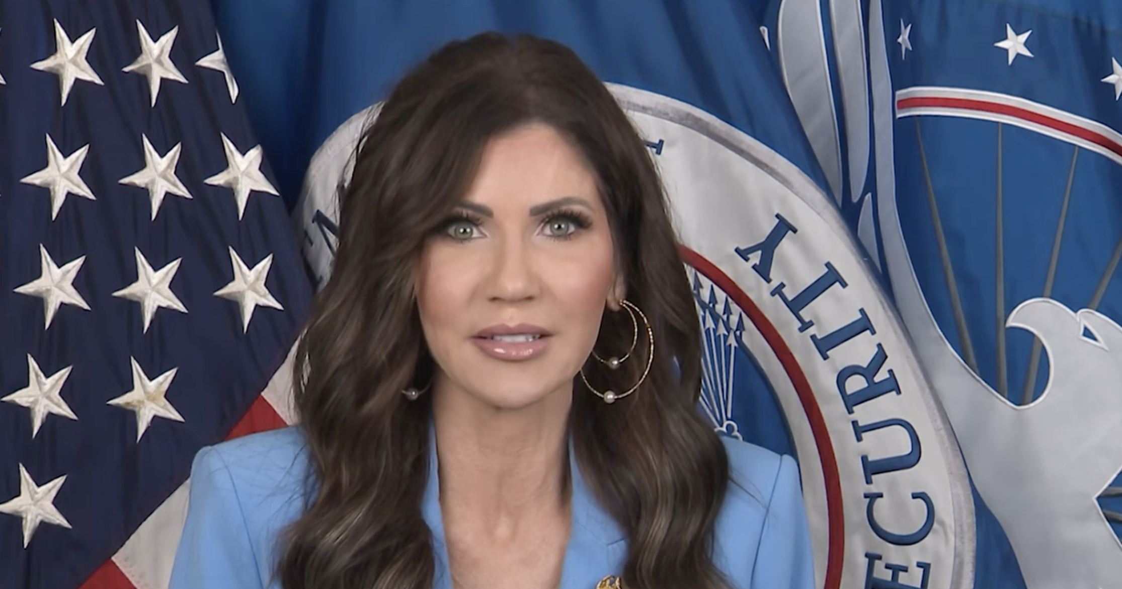 Kristi Noem in video playing in airports.