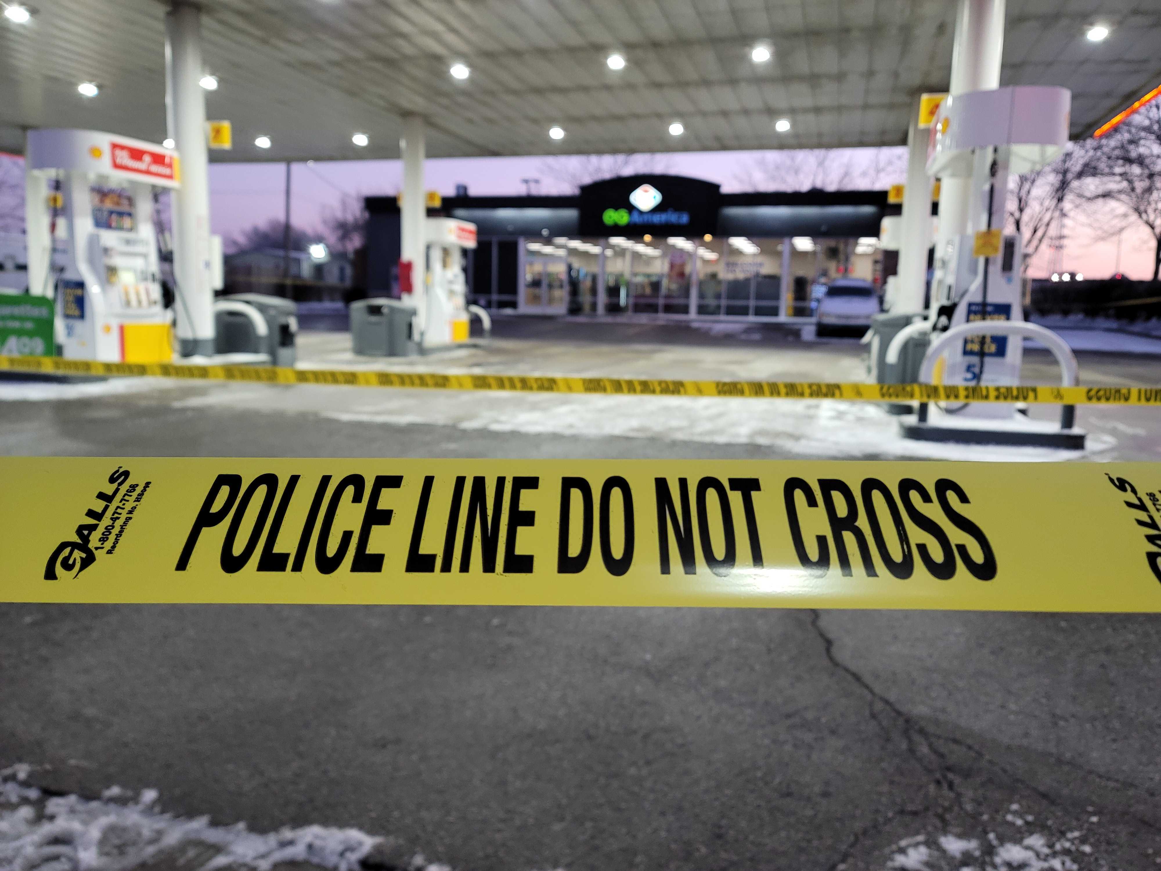 police do not cross gas station.jpg