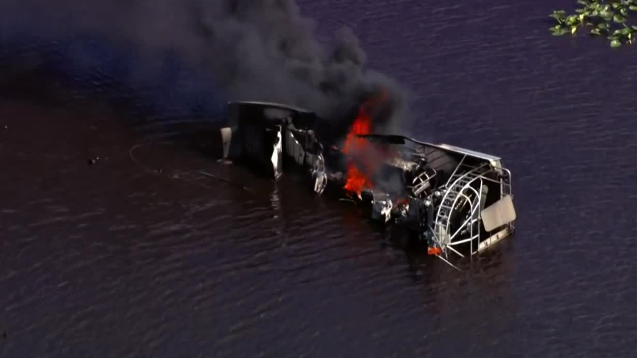 An airboat on fire in a body of water off Loxahatchee Road in Parkland on the Broward-Palm Beach County line on March 18, 2022.jpg