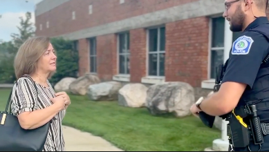 Kentwood officer with resident