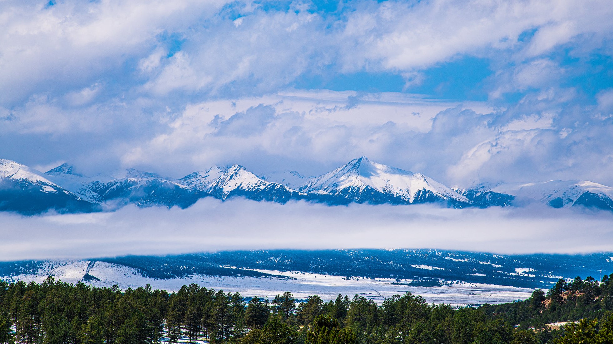 Steve Shugart Westcliffe snowy mountains and clouds
