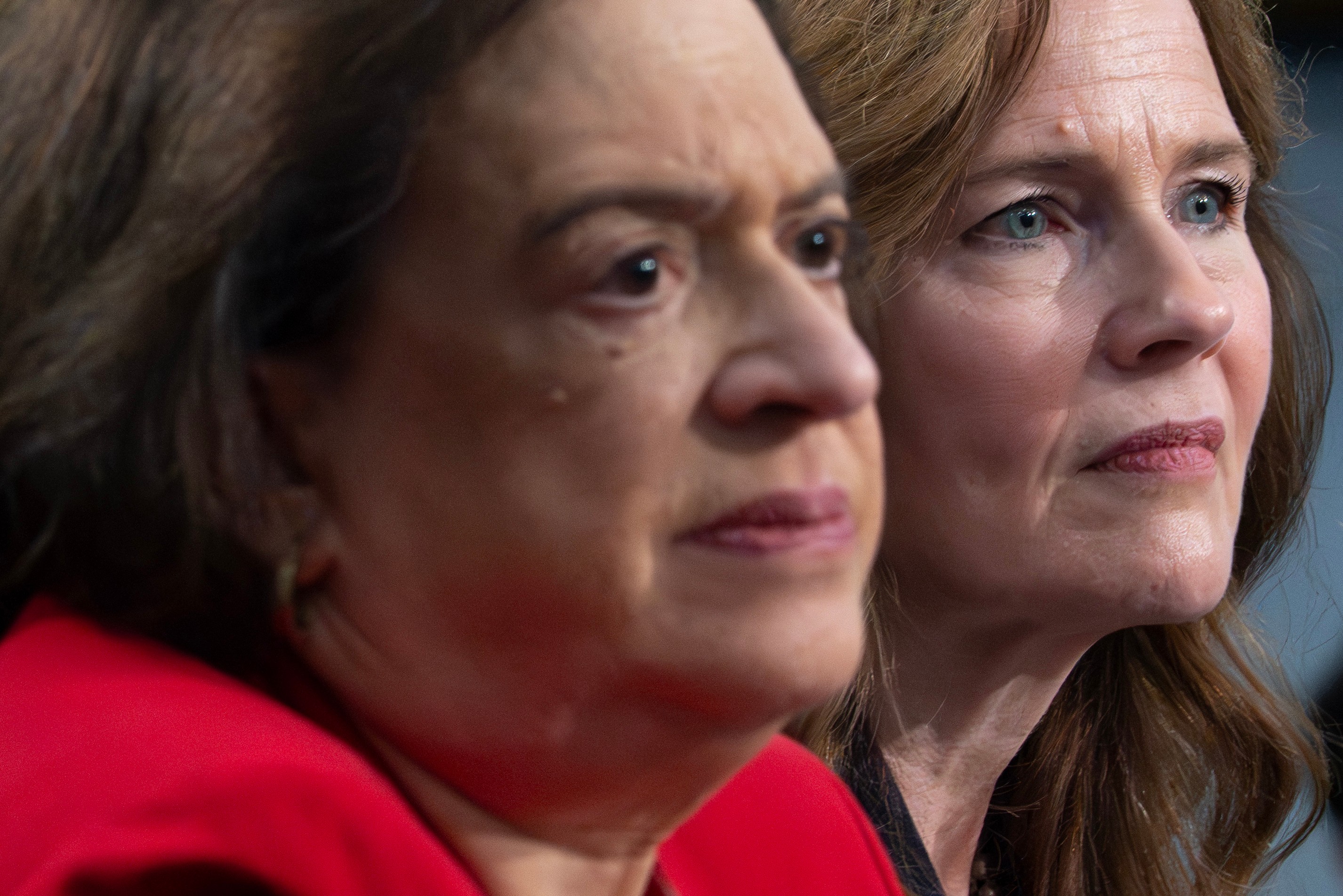 Supreme Court Justices Amy Coney Barrett, right, and Elena Kagan testify during a House Appropriations subcommittee  hearing, Tuesday, July 14, 2026, on Capitol Hill in Washington.