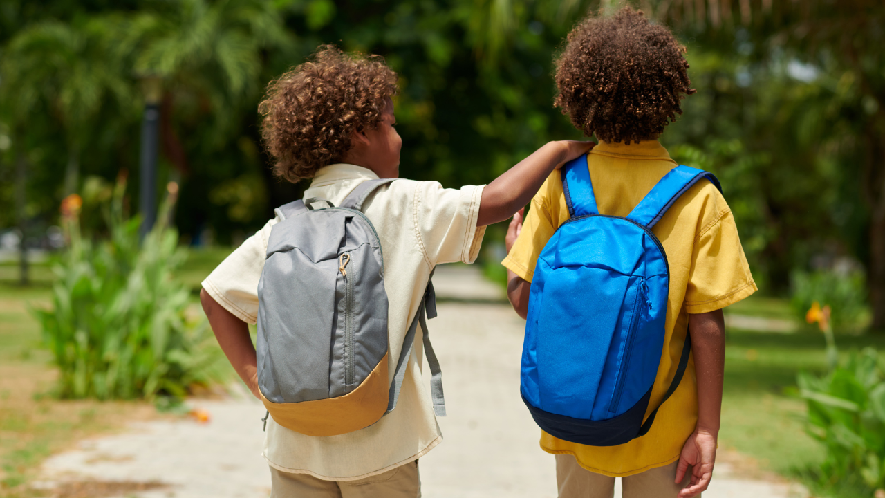 Kids with Backpacks in Park