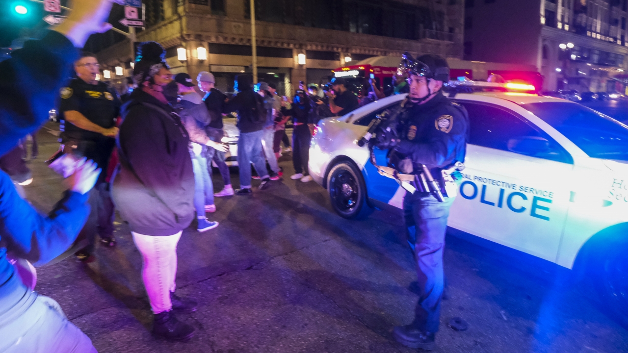 Abortion rights protesters confront police officers in Los Angeles