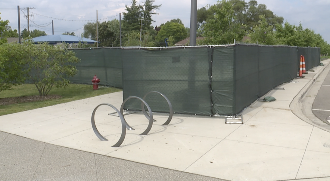 The Rochester Hills splash pad with a fence around the crime scene