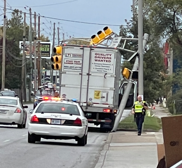 A truck takes out a light pole near the intersection of Washington and Rural.  Businesses and homeowners say the North Split construction is taking its toll on city streets.