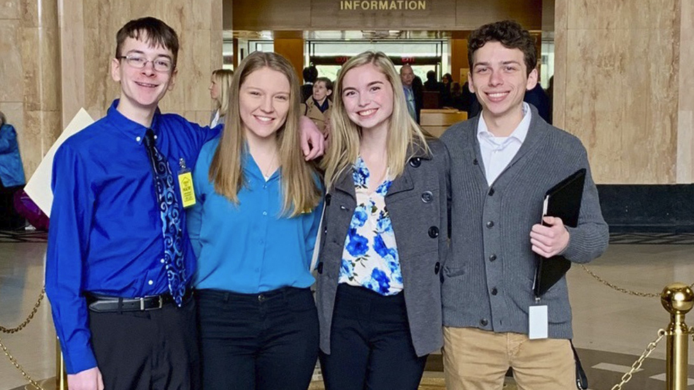 Sam Adamson, from left, Lori Riddle, Hailey Hardcastle and Derek Evans at the Oregon State Capitol in Salem.
