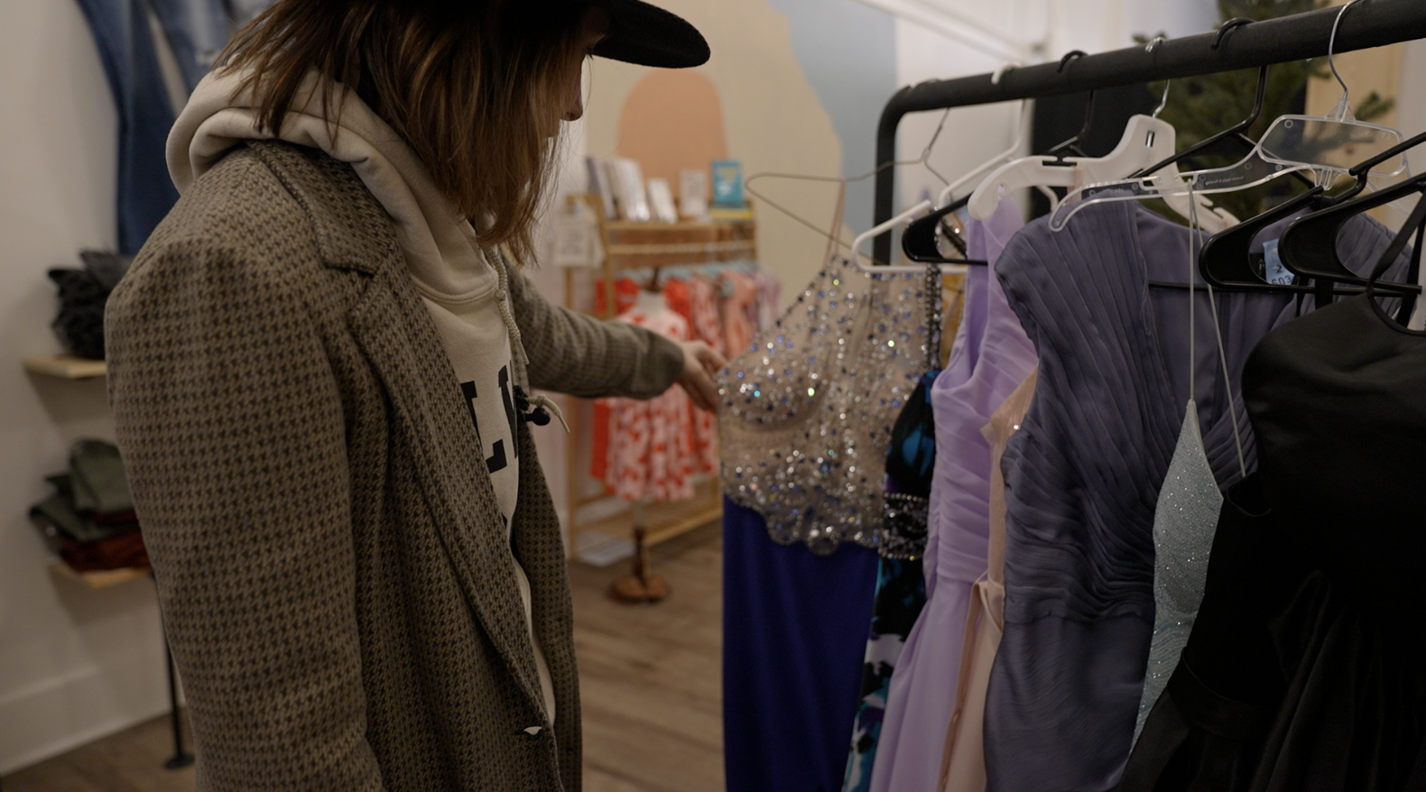 Emily Baudoux, owner of Rise Up Co., is collecting prom dresses at her St. Johns store to donate to the Vineyard Creative Arts Theatre Prom Dress Giveaway in Ovid