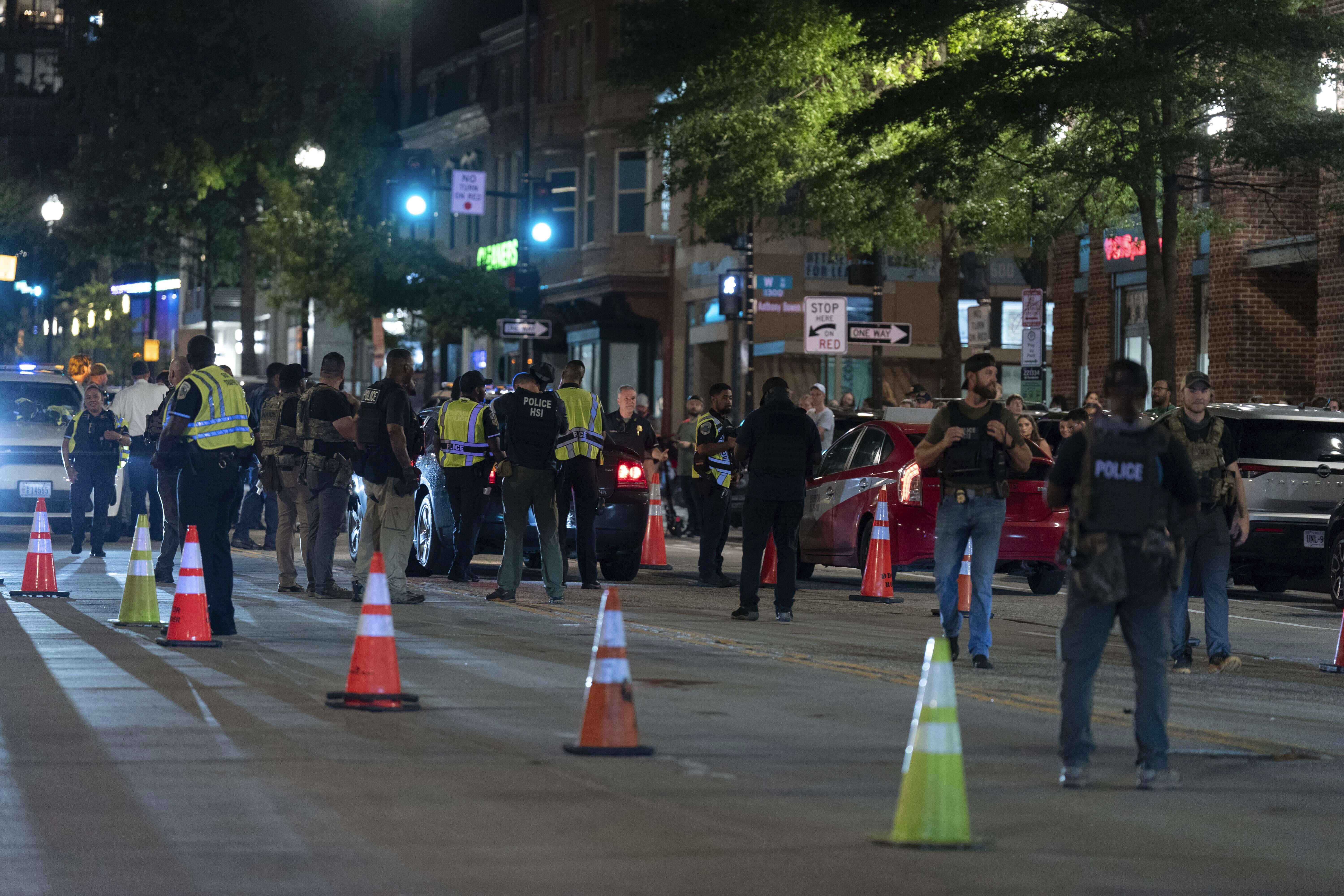 Department of Homeland Security Investigations agents join Washington Metropolitan Police Department officers as they conduct traffic checks at a checkpoint along 14th Street in northwest Washington, Wednesday, Aug. 13, 2025, in Washington.