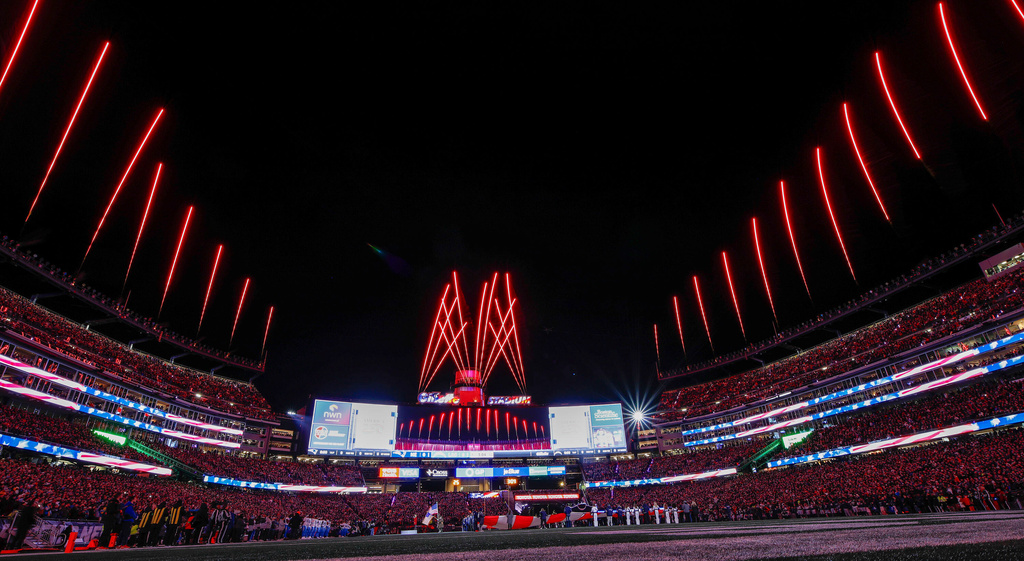 Fireworks explode above Gillette Stadium prior to an NFL wild card playoff football game between the New England Patriots and the Los Angeles Chargers, Sunday, Jan. 11, 2026, in Foxborough, Mass. 