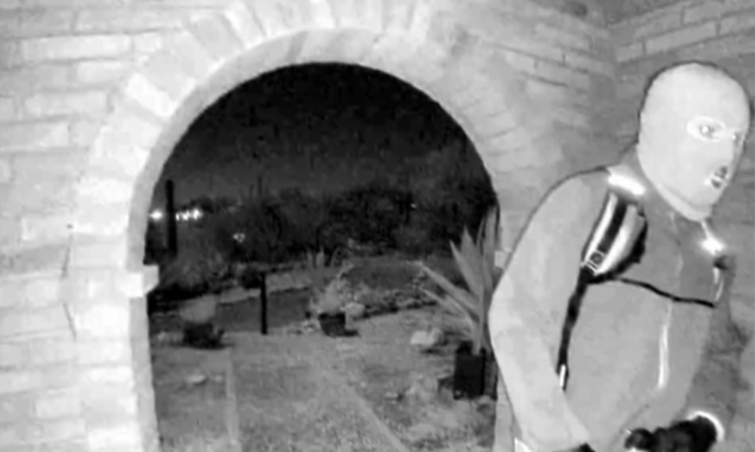 Masked man outside Nancy Guthrie's home