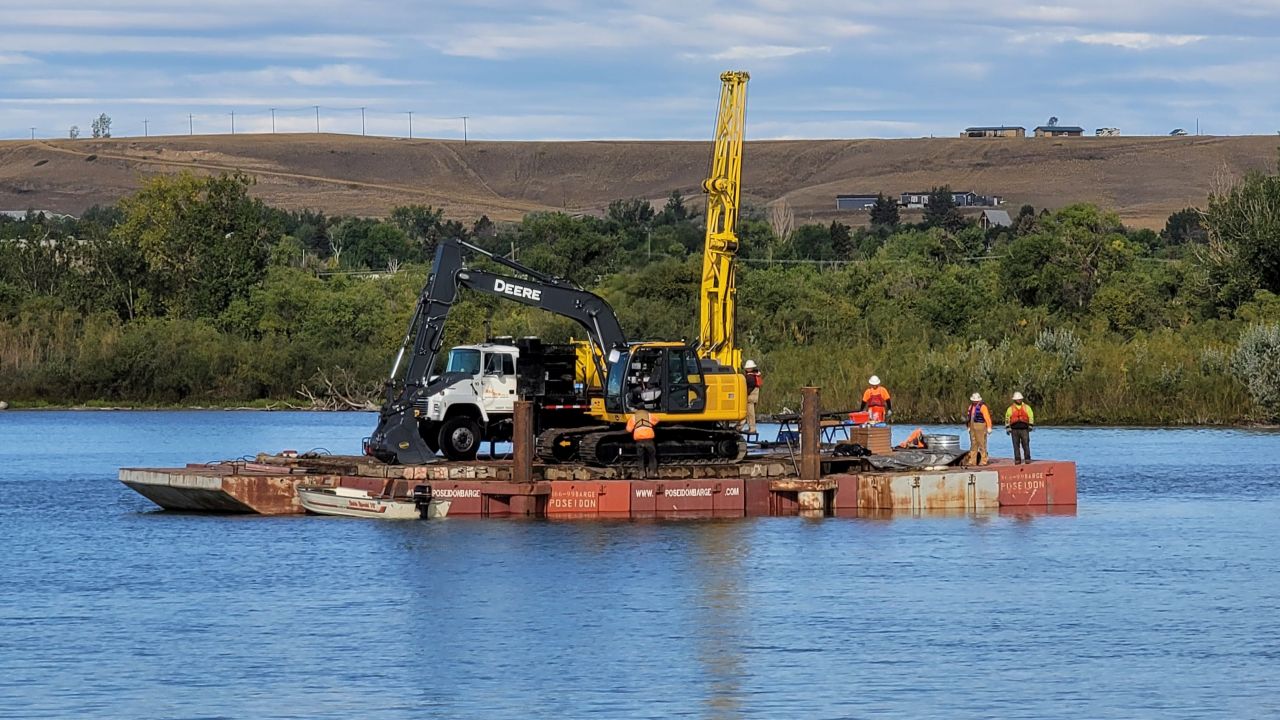 Why is there a barge on the river in Great Falls?