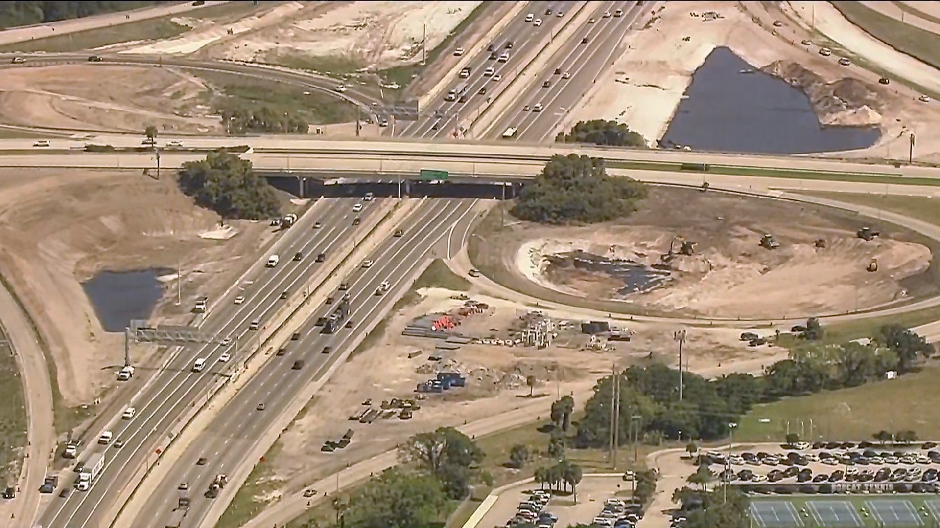 Bird's eye view of construction to Glades Road interchange at I-95