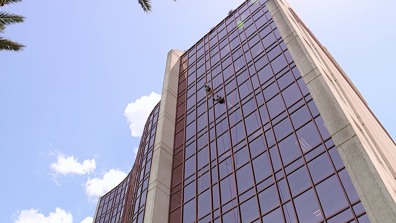 Lakeland residents rappel down 10-story Lakeland Electric building to raise money for at-risk girls