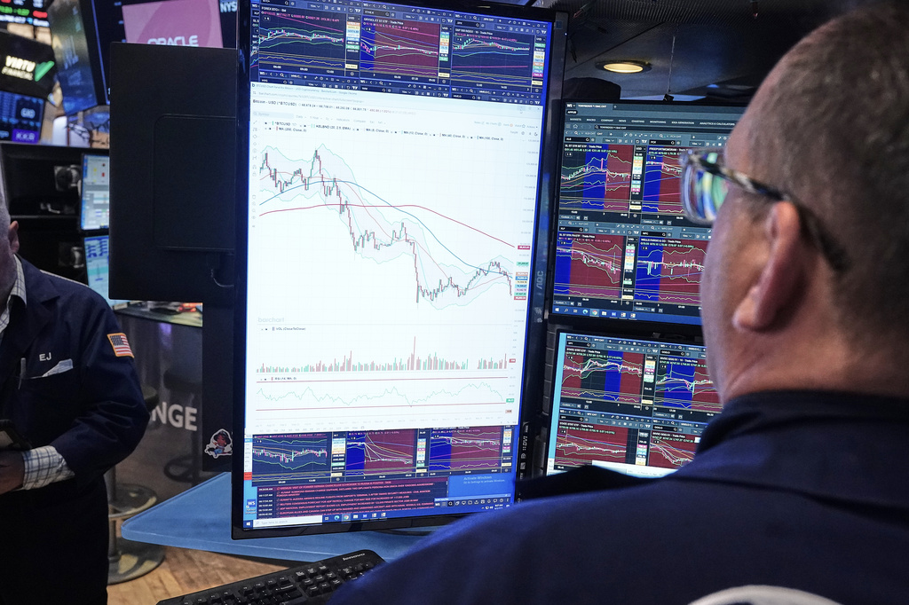 Specialist Anthony Matesic works at his post on the floor of the New York Stock Exchange, Wednesday, June 3, 2026. 