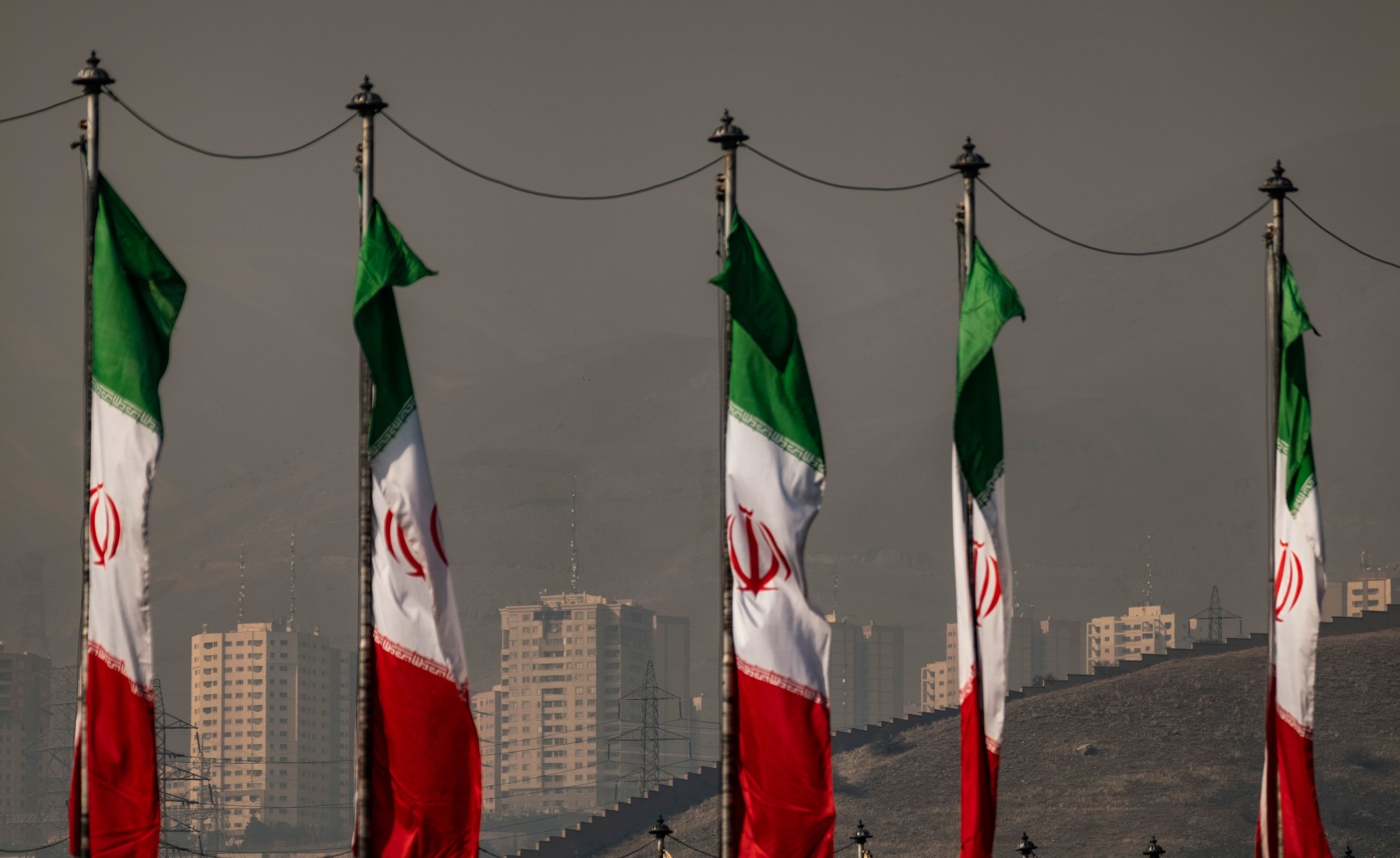 Iranian flags flutter in northern Tehran on January 9.