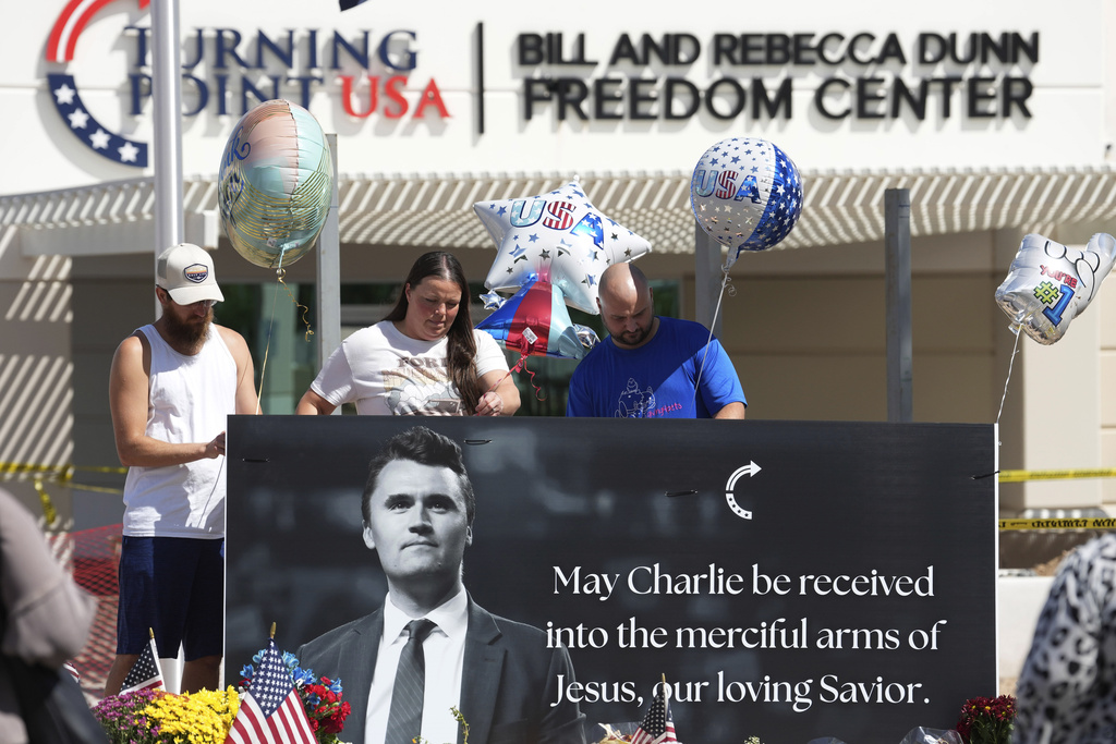 Well-wishers add balloons to a makeshift memorial set up at Turning Point USA headquarters after the shooting death at a Utah college on Wednesday of Charlie Kirk, the 31-year-old founder and CEO of the organization, Thursday, Sept. 11, 2025, in Phoenix. 