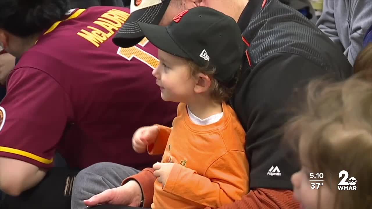 Young Orioles fans celebrate upcoming Opening Day with the Oriole Bird