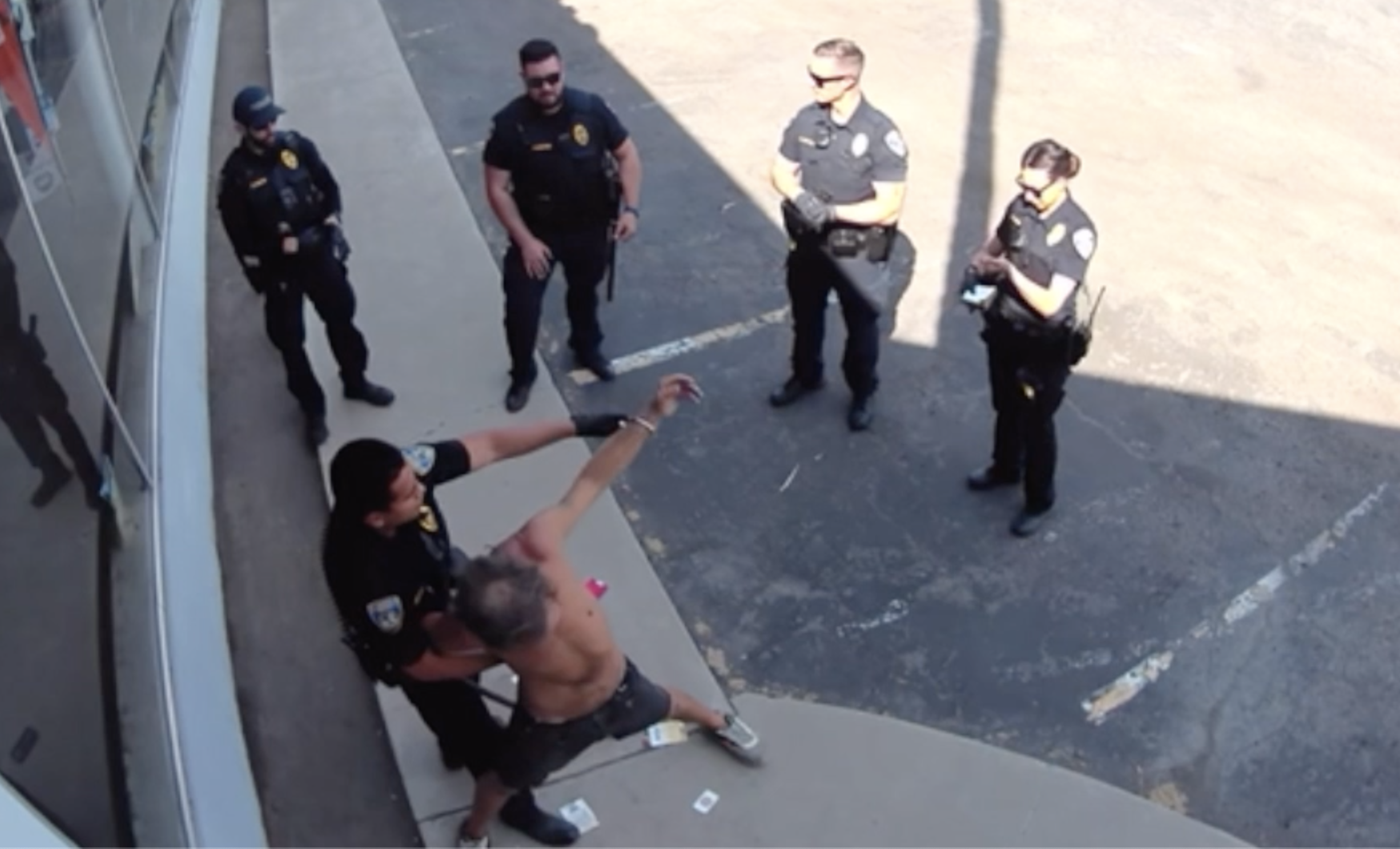guy getting arrested outside san joaquin tractor