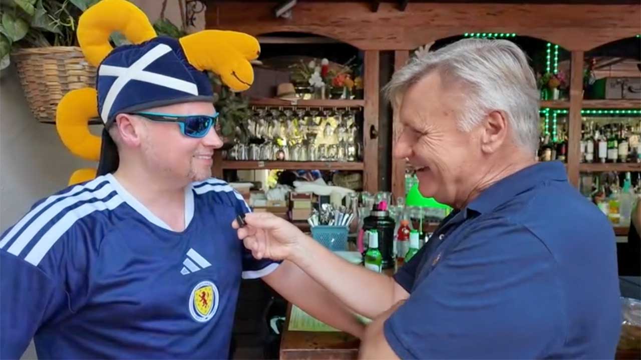WPTV reporter Matt Sczesny speaks to a member of the Scottish Tartan Army in Miami.