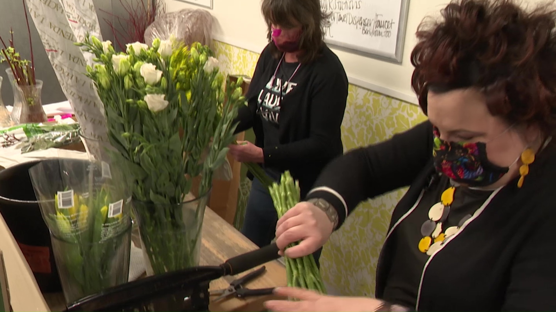 Flower and candy shops prep for Valentine's Day