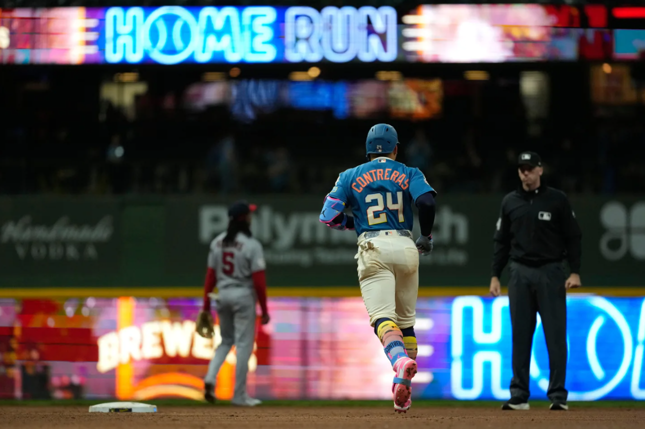 Milwaukee Brewers' William Contreras rounds the bases after hitting a solo home run during the ninth inning of a baseball game against the Washington Nationals, Saturday, April 11, 2026, in Milwaukee. 