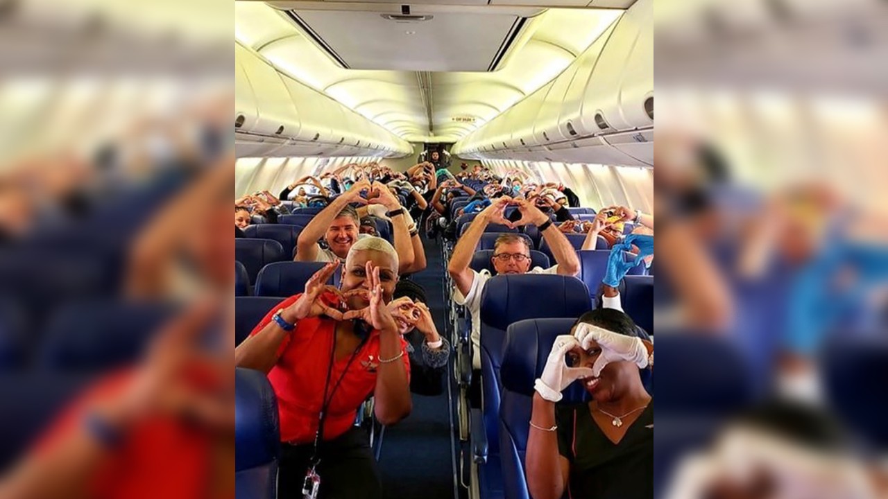 Photo of health care workers flying to help fight COVID-19 in New York goes viral