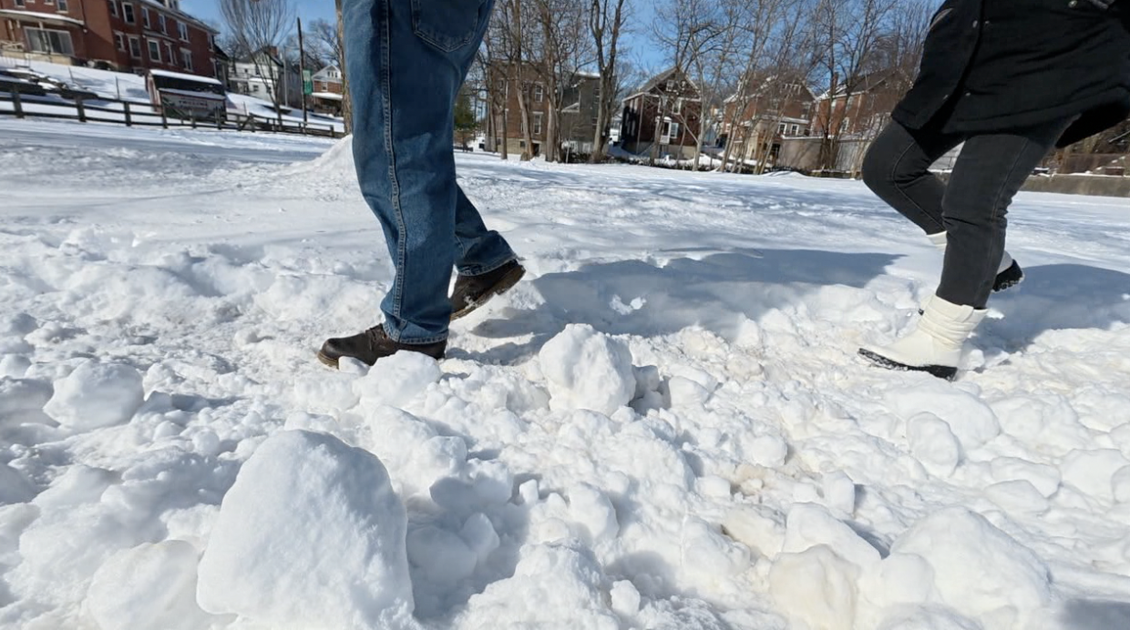 Plow Pushes Snow Back on Sidewalk