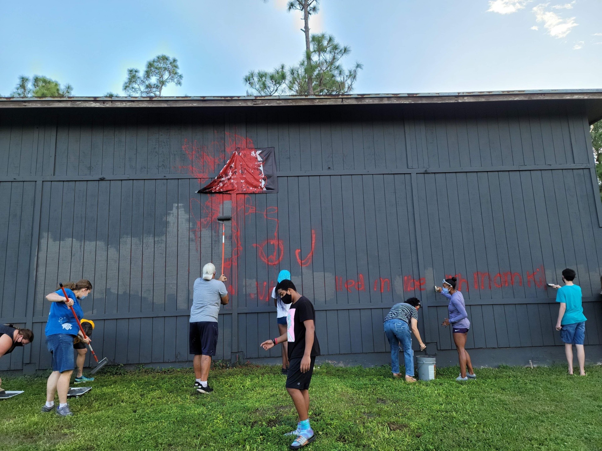 Neighbors clean up after Jupiter Farms property vandalized for sixth time