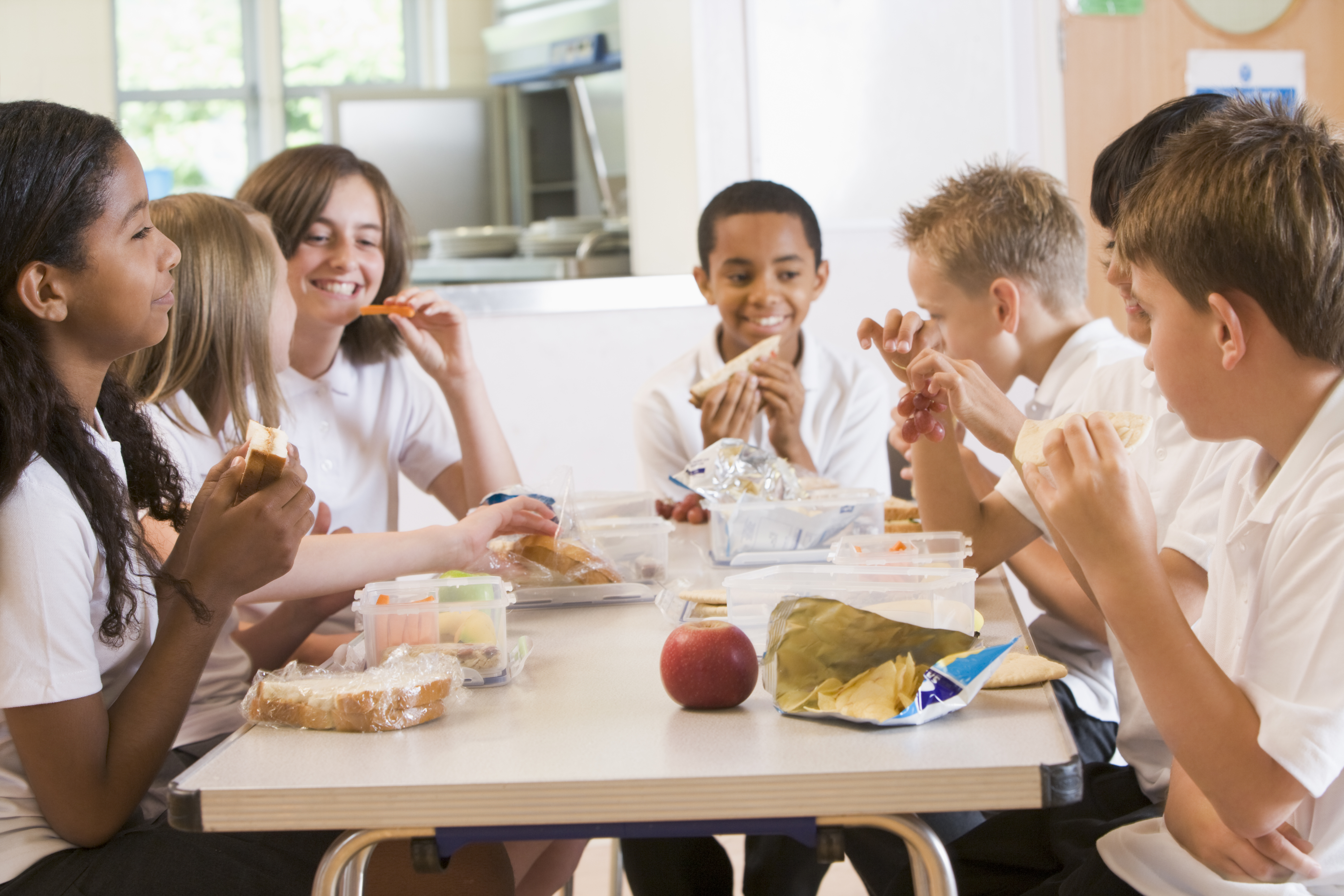 Schoolchildren enjoying their lunch