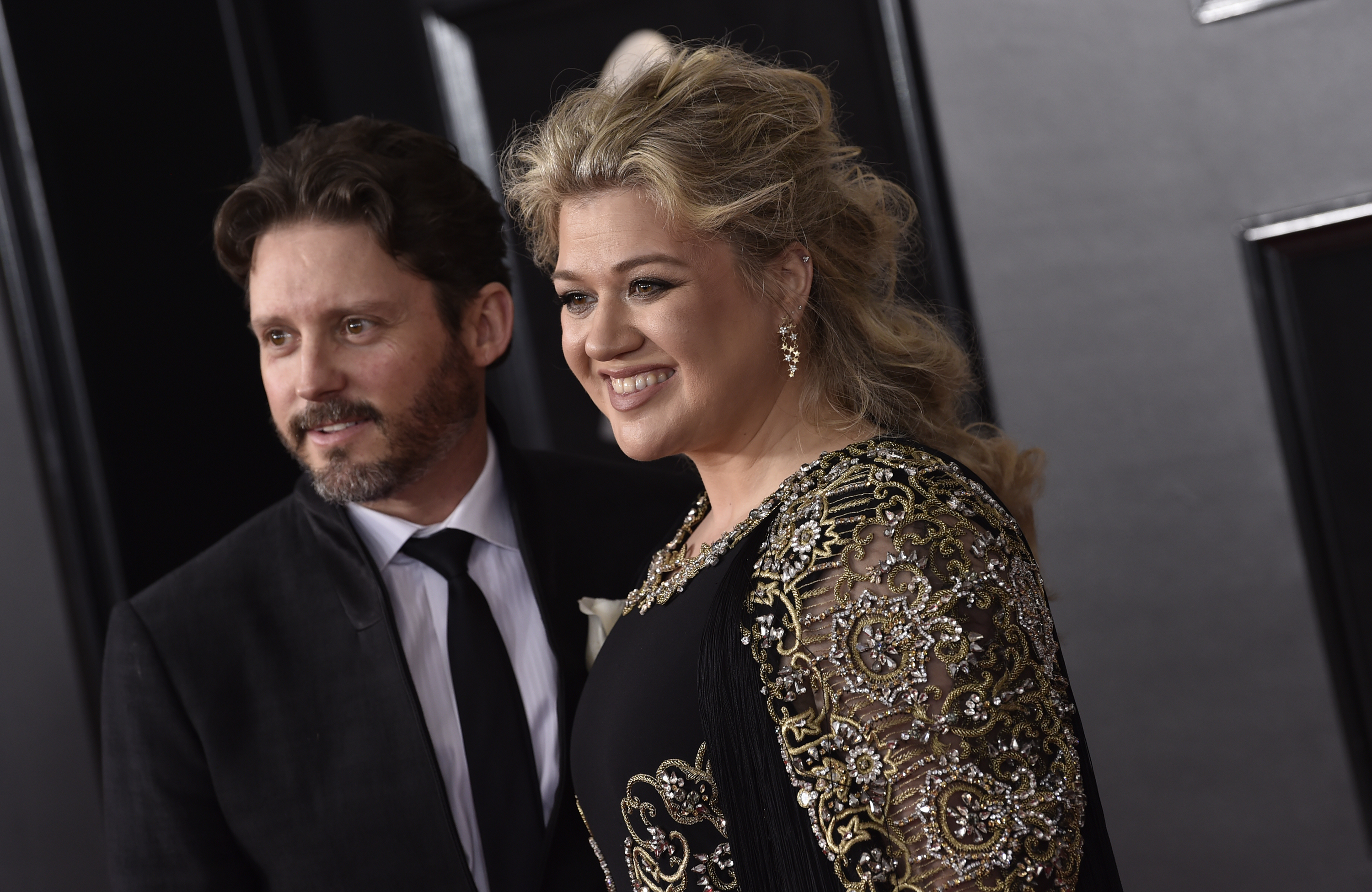 Kelly Clarkson and Brandon Blackstock arrive at the 60th annual Grammy Awards at Madison Square Garden on Sunday, Jan. 28, 2018, in New York. 