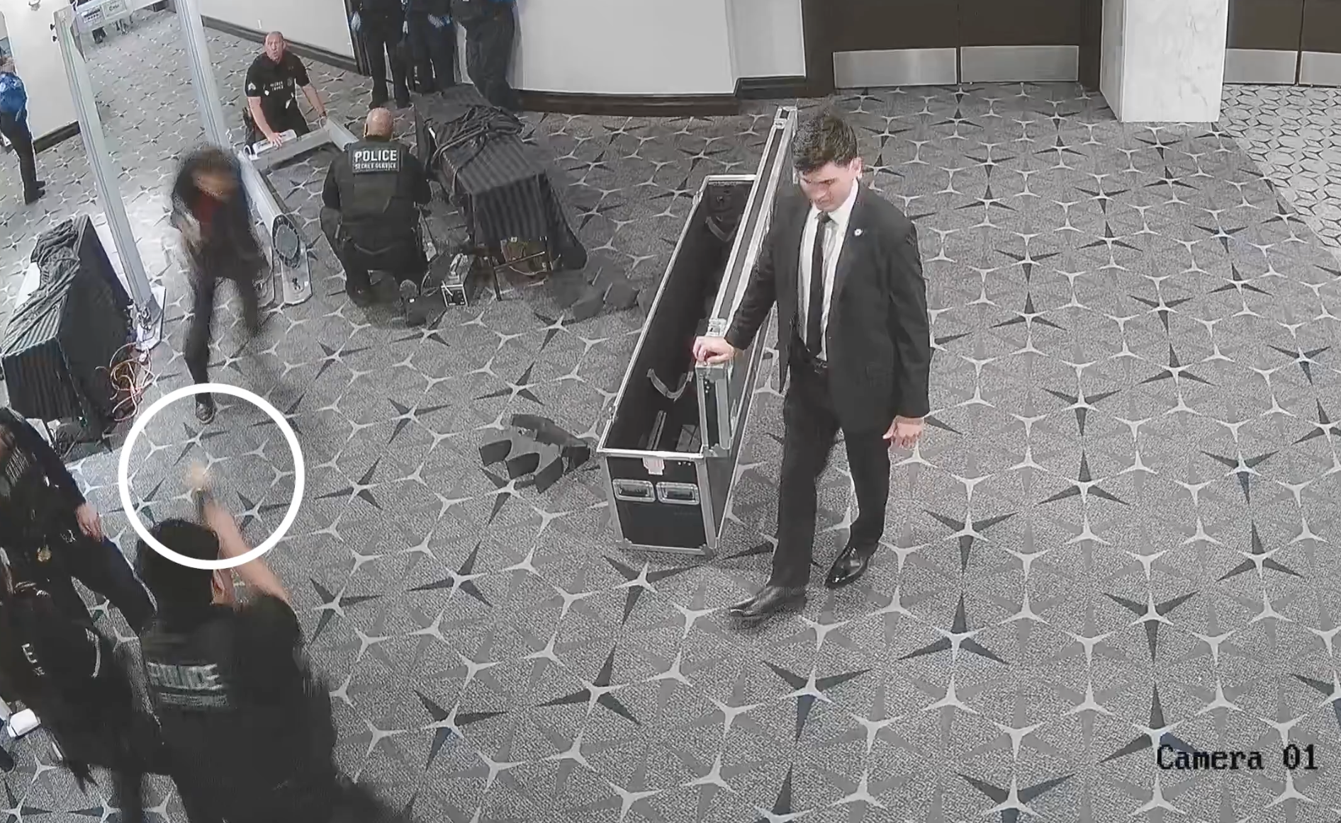 Surveillance video showing a man storming security during the White House Correspondents' Dinner. 
