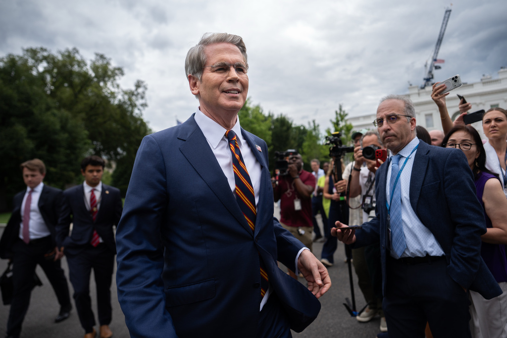 Treasury Secretary Scott Bessent walks past reporters following an interview with Fox News outside the White House, Thursday, July 30, 2026, in Washington. 