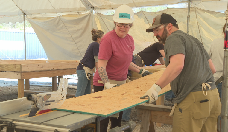 Hundreds of Nashville realtors volunteer to help build homes for Habitat for Humanity 