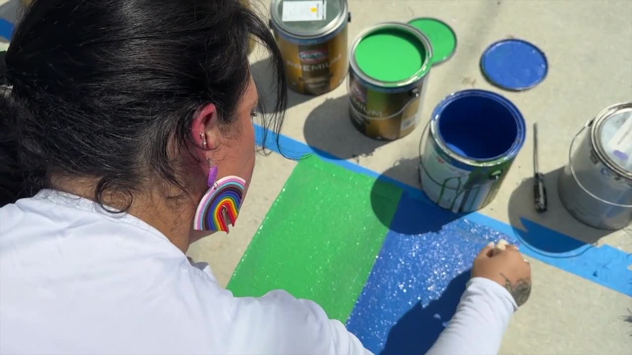 Florida artist painting murals on private property