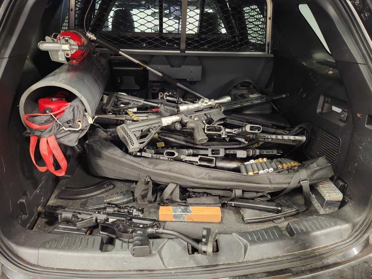 Man arrested, weapons seized after chase